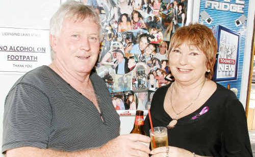 Grand Hotel publicans Dennis and Pam Corliss toast to a happier future after a recent court ruling against them. Grand Hotel publicans Dennis and Pam Corliss toast to a happier future after a recent court ruling against them.